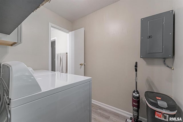 145 White Ave, Lincoln, IL 62656 - laundry area featuring electric panel, independent washer and dryer, and light wood finished floors