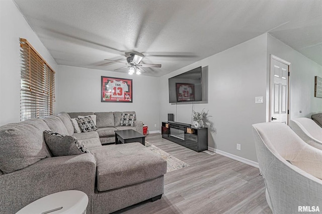 145 White Ave, Lincoln, IL 62656 - living area with a ceiling fan and light wood finished floors