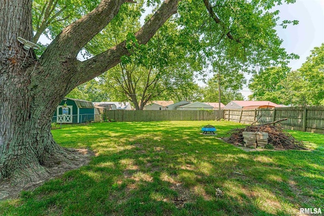 145 White Ave, Lincoln, IL 62656 - fenced backyard with a shed