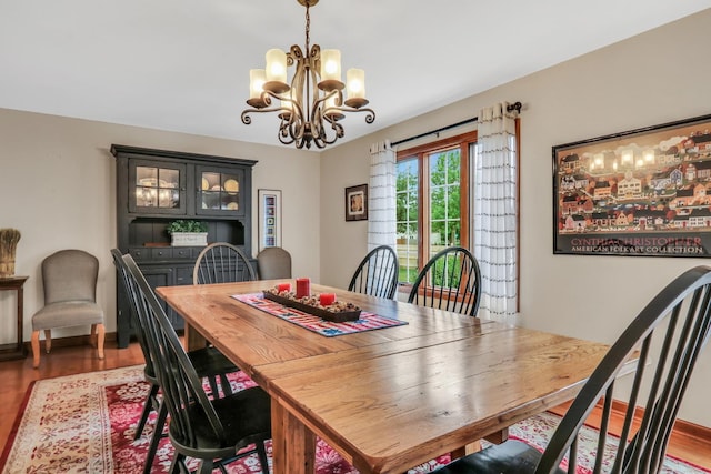 330 Dorchester Ln, Grayslake, IL 60030 - dining area featuring a chandelier and wood finished floors