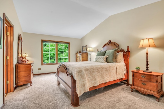 330 Dorchester Ln, Grayslake, IL 60030 - carpeted bedroom with vaulted ceiling and baseboards