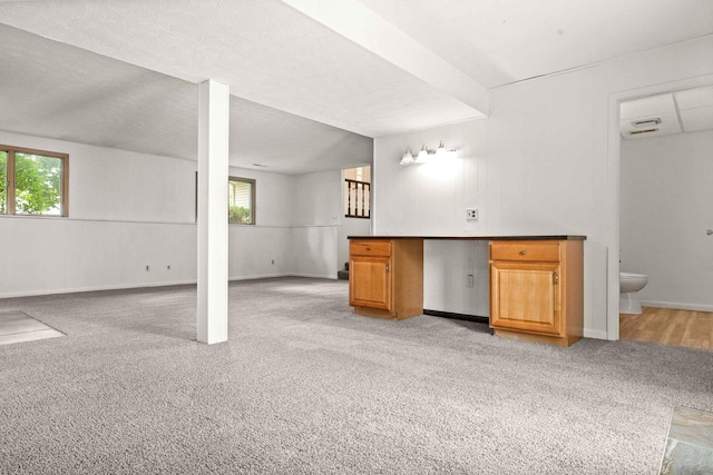 1219 Nicki Dr, Bloomington, IL 61704 - unfurnished living room with light carpet and healthy amount of natural light