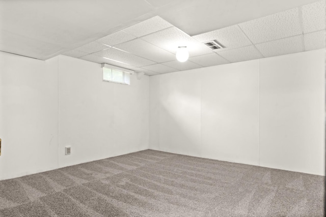 1219 Nicki Dr, Bloomington, IL 61704 - below grade area featuring carpet and a paneled ceiling