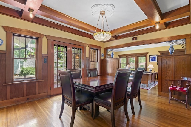 321 W Chebanse Ave, Chebanse, IL 60922 - dining space featuring wood-type flooring, coffered ceiling, healthy amount of natural light, beam ceiling, and wainscoting