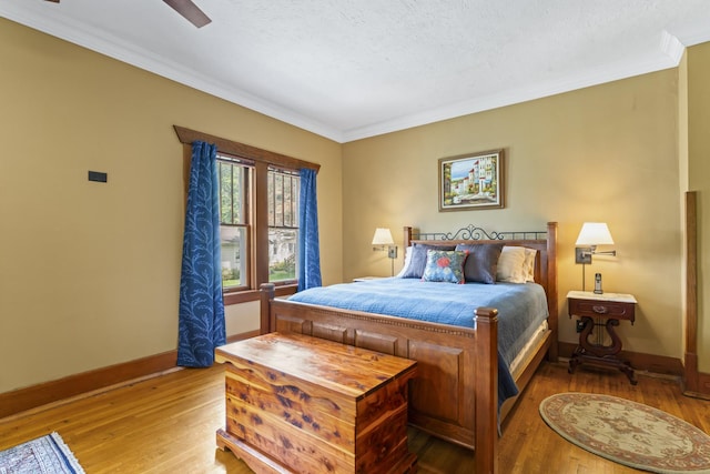 321 W Chebanse Ave, Chebanse, IL 60922 - bedroom with crown molding and light wood-style flooring