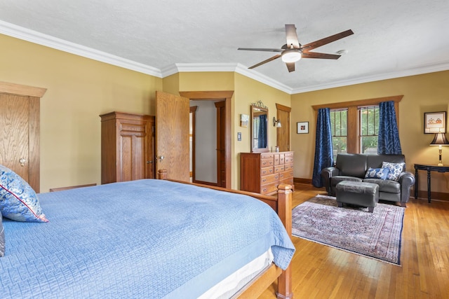 321 W Chebanse Ave, Chebanse, IL 60922 - bedroom with ornamental molding, hardwood / wood-style floors, and a ceiling fan