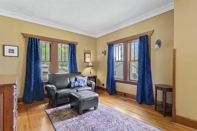321 W Chebanse Ave, Chebanse, IL 60922 - living room with wood finished floors and ornamental molding