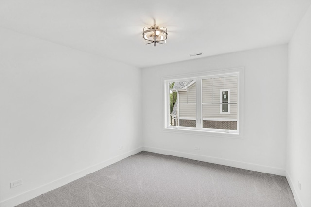 16540 Pear Ave, Orland Park, IL 60467 - spare room featuring baseboards and carpet