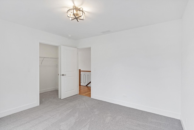 16540 Pear Ave, Orland Park, IL 60467 - unfurnished bedroom with carpet flooring and a spacious closet