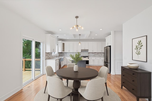 16540 Pear Ave, Orland Park, IL 60467 - dining area with light wood-style flooring, recessed lighting, and a chandelier