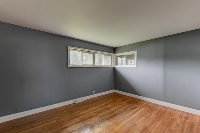 16218 Sussex Ct, Markham, IL 60428 - spare room featuring wood finished floors and baseboards