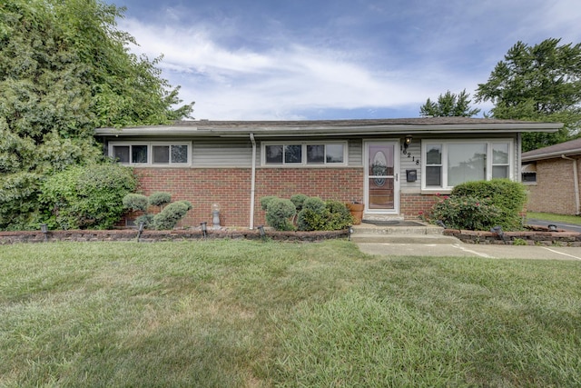 16218 Sussex Ct, Markham, IL 60428 - ranch-style house featuring brick siding and a front lawn