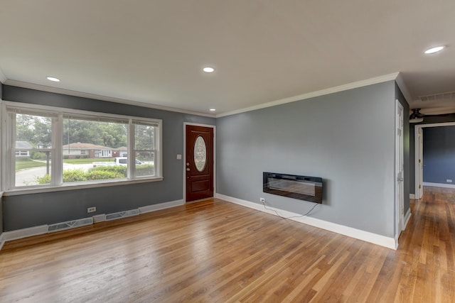 16218 Sussex Ct, Markham, IL 60428 - foyer with ornamental molding, heating unit, recessed lighting, and wood finished floors