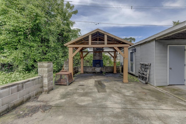 16218 Sussex Ct, Markham, IL 60428 - view of parking / parking lot featuring an outdoor fireplace and a gazebo