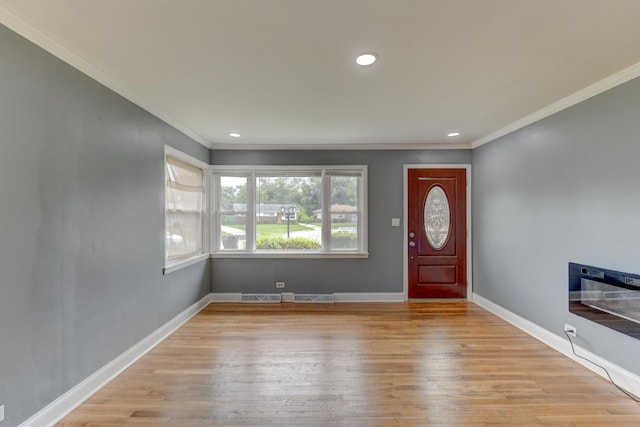 16218 Sussex Ct, Markham, IL 60428 - foyer entrance featuring ornamental molding, wood finished floors, and recessed lighting