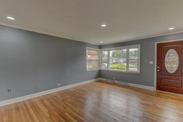 16218 Sussex Ct, Markham, IL 60428 - entryway featuring crown molding, wood finished floors, and recessed lighting