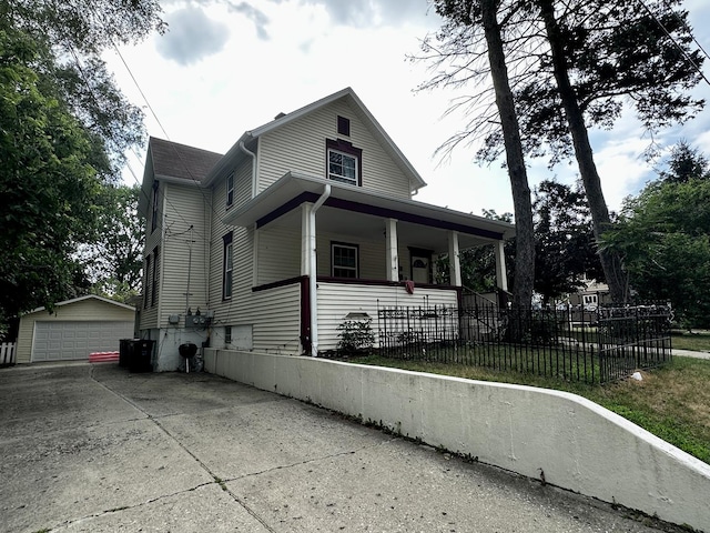 39 Leonard St, Elgin, IL 60123 - bungalow-style house with an outdoor structure, a porch, and a garage