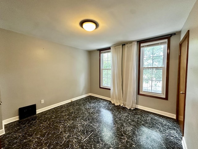 39 Leonard St, Elgin, IL 60123 - empty room with healthy amount of natural light
