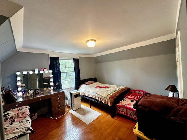 39 Leonard St, Elgin, IL 60123 - bedroom with vaulted ceiling and wood finished floors