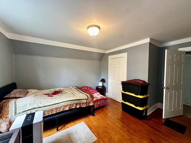 39 Leonard St, Elgin, IL 60123 - bedroom with vaulted ceiling and wood finished floors