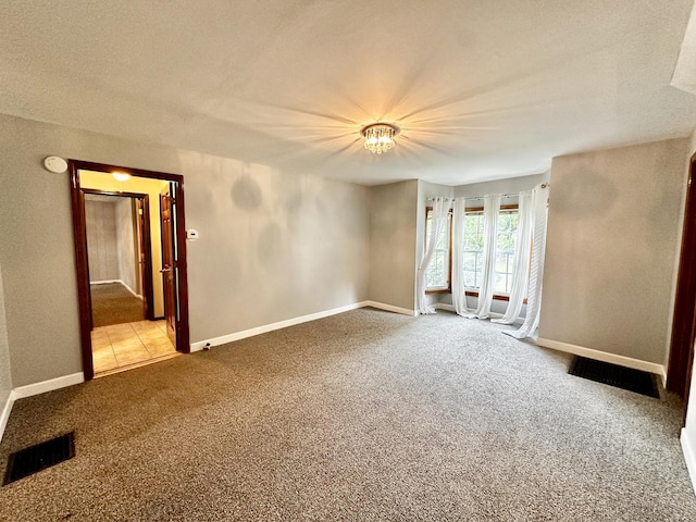 39 Leonard St, Elgin, IL 60123 - unfurnished room with carpet flooring and baseboards