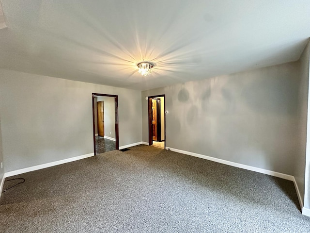 39 Leonard St, Elgin, IL 60123 - carpeted empty room with baseboards