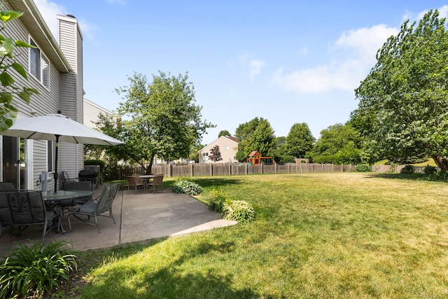 1356 Geneva Ln, Cary, IL 60013 - fenced backyard featuring a playground and a patio