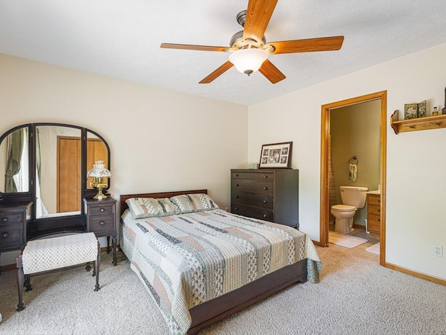 1375 Coven Cir, Davis, IL 61019 - carpeted bedroom featuring connected bathroom and a ceiling fan