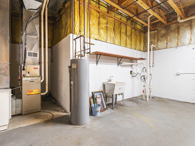 1375 Coven Cir, Davis, IL 61019 - unfinished below grade area with water heater and heating unit