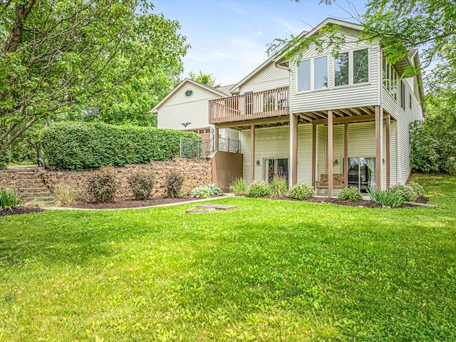 1375 Coven Cir, Davis, IL 61019 - back of house with a wooden deck and a yard