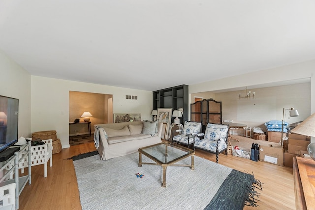 72 Atteridge Rd, Lake Forest, IL 60045 - living area featuring wood finished floors and a chandelier