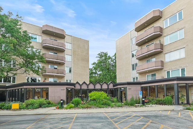 6411 Lincoln Ave Unit 412, Morton Grove, IL 60053 - view of apartment building / complex with uncovered parking