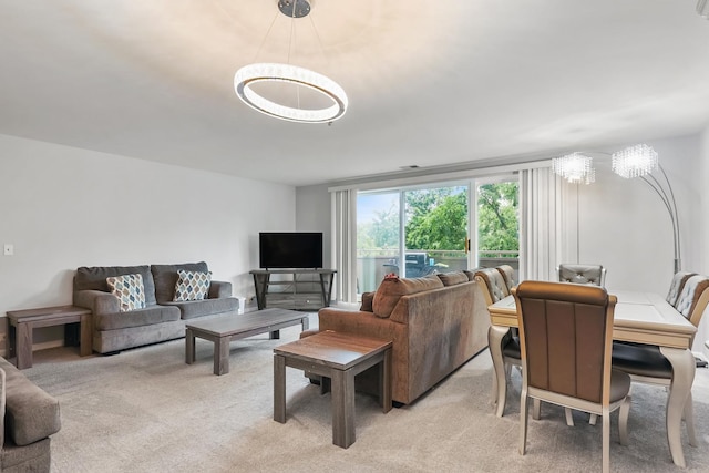 6411 Lincoln Ave Unit 412, Morton Grove, IL 60053 - living room featuring a chandelier and light colored carpet
