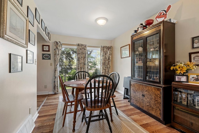 125 E Robinhood Way, Bolingbrook, IL 60440 - dining space featuring wood finished floors