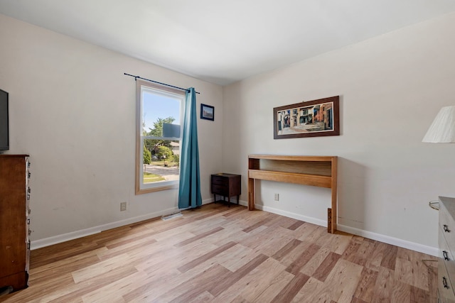 125 E Robinhood Way, Bolingbrook, IL 60440 - unfurnished office featuring light wood-type flooring