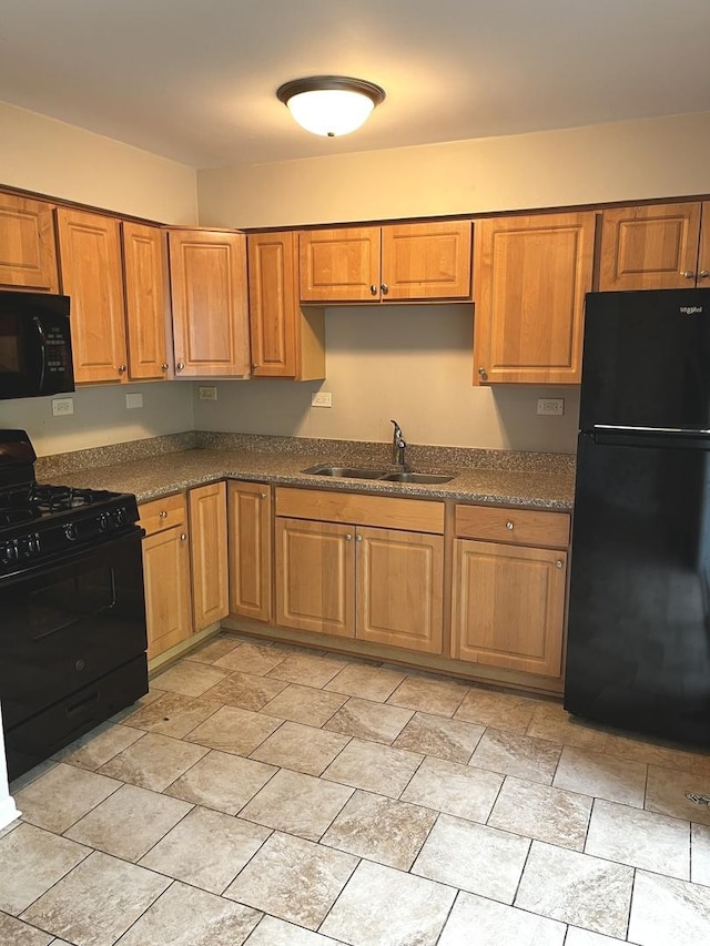 548 Landau Rd, University Park, IL 60484 - kitchen featuring black appliances, dark countertops, brown cabinets, and light stone finish floors