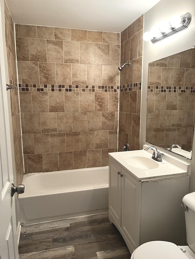 548 Landau Rd, University Park, IL 60484 - bathroom with wood finished floors, shower / tub combination, and vanity