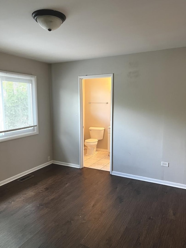 548 Landau Rd, University Park, IL 60484 - unfurnished room with wood finished floors and baseboards