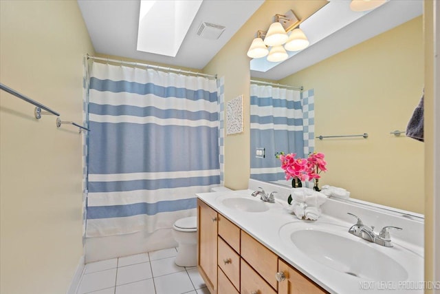 25660 N Countryside Dr, Lake Barrington, IL 60010 - full bath with tile patterned flooring, double vanity, a skylight, and shower / bathtub combination with curtain