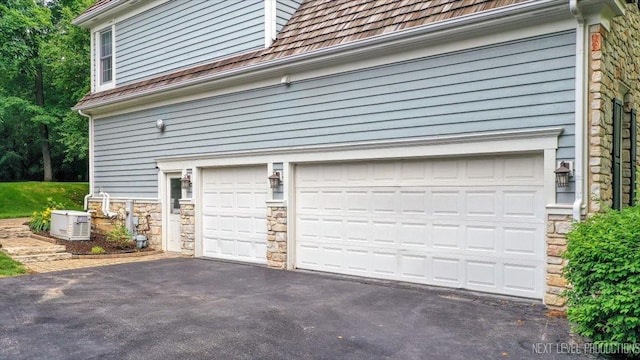 25660 N Countryside Dr, Lake Barrington, IL 60010 - garage with asphalt driveway