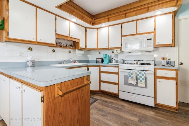 19705 Glennell Ave, Mokena, IL 60448 - kitchen featuring white appliances, decorative backsplash, dark wood-style flooring, light countertops, and white cabinetry