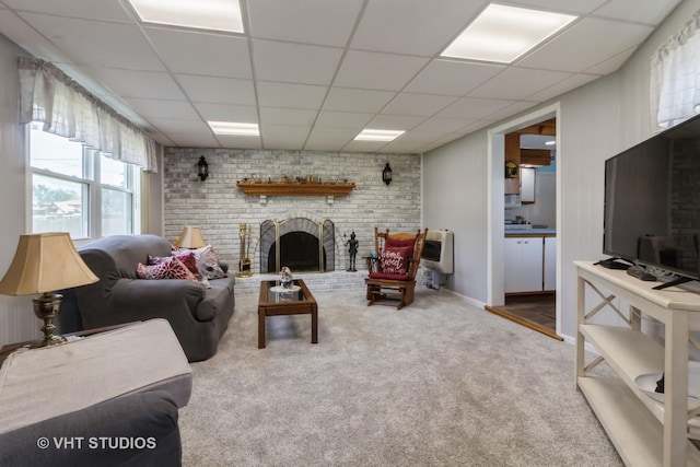 19705 Glennell Ave, Mokena, IL 60448 - living room featuring carpet, a drop ceiling, a fireplace, and heating unit