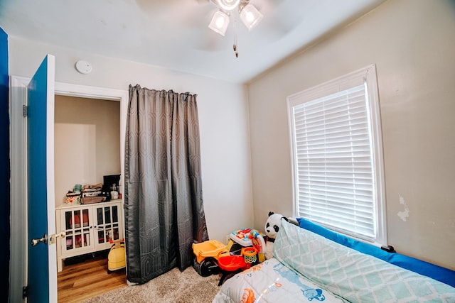 240 E 3rd Ave, Clifton, IL 60927 - bedroom with wood finished floors and a ceiling fan
