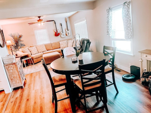 240 E 3rd Ave, Clifton, IL 60927 - dining area with light wood-type flooring and a ceiling fan