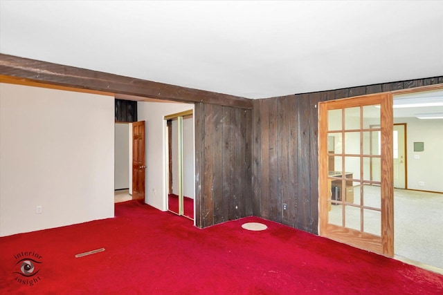 7235 174th Pl, Tinley Park, IL 60477 - carpeted spare room featuring wood walls