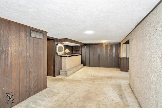 7235 174th Pl, Tinley Park, IL 60477 - finished below grade area with wooden walls, carpet flooring, and a textured ceiling