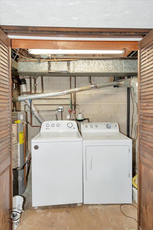 7235 174th Pl, Tinley Park, IL 60477 - laundry room featuring gas water heater, washer and dryer, and concrete block wall