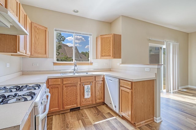2559 Lincoln Park Ct Unit 2559, Crest Hill, IL 60403 - kitchen featuring white appliances, under cabinet range hood, a peninsula, light wood-style flooring, and recessed lighting