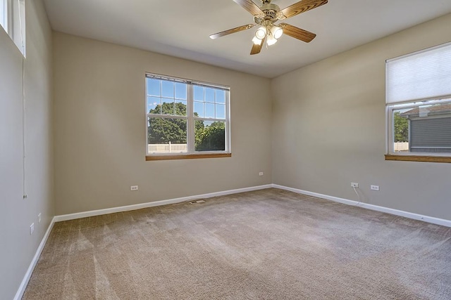 2559 Lincoln Park Ct Unit 2559, Crest Hill, IL 60403 - unfurnished room featuring plenty of natural light, carpet, and a ceiling fan