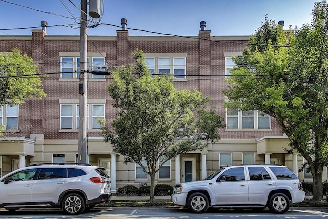 7501 Brown Ave Unit 3C, Forest Park, IL 60130 - view of building exterior featuring uncovered parking